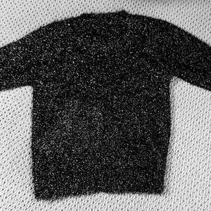 Elegant sweater with metallic threads